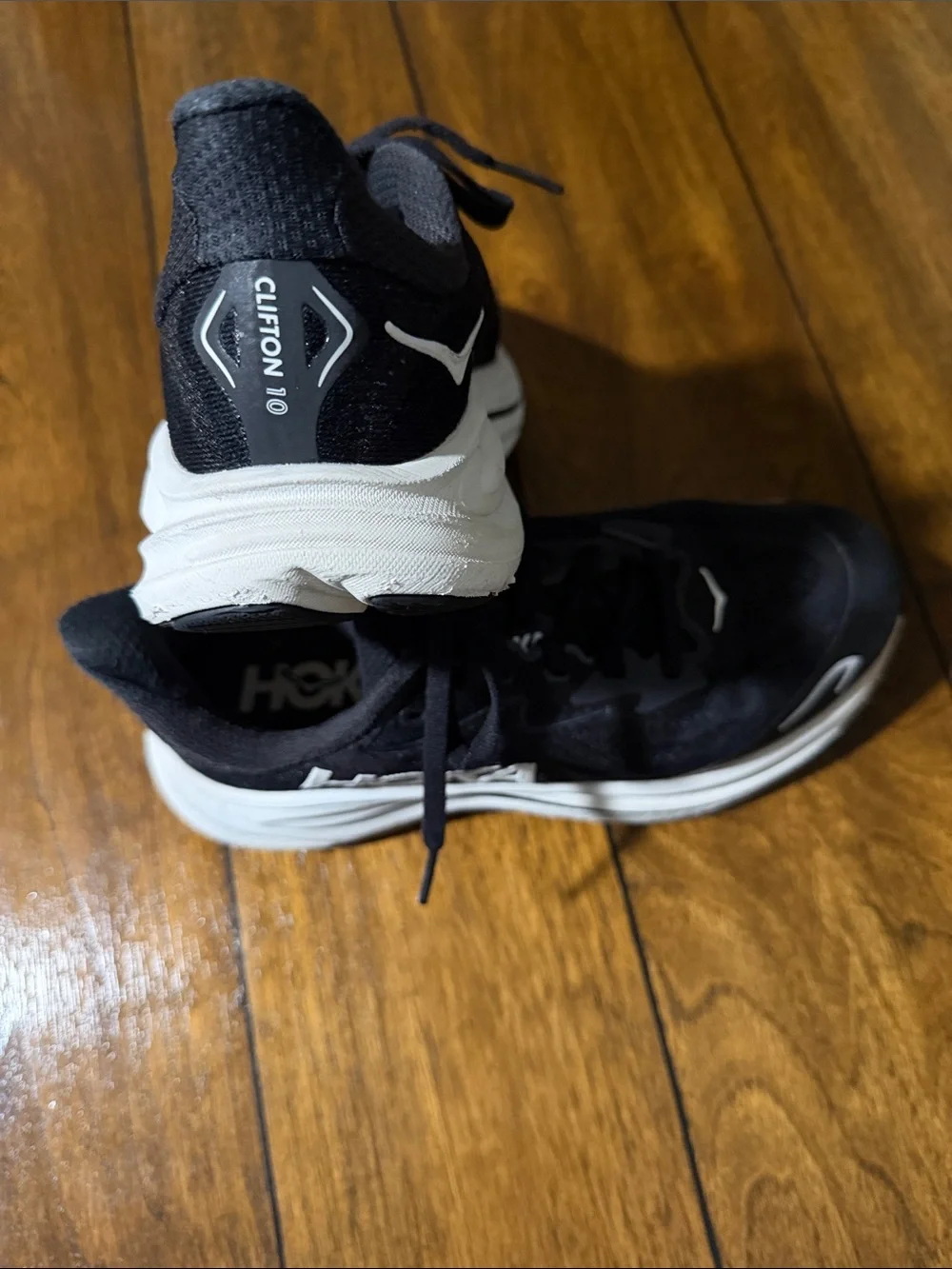 Hoka Black and White Road Running Shoes